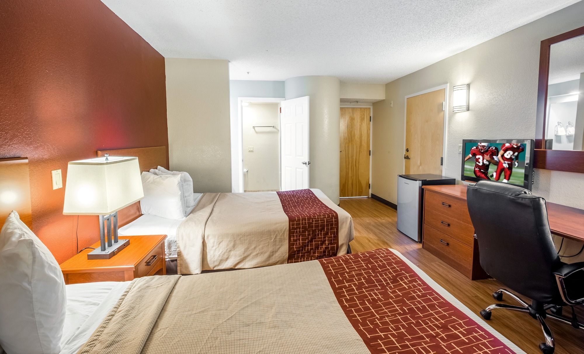 standard double room, 2 double beds | desk, laptop workspace, blackout curtains, iron/ironing board