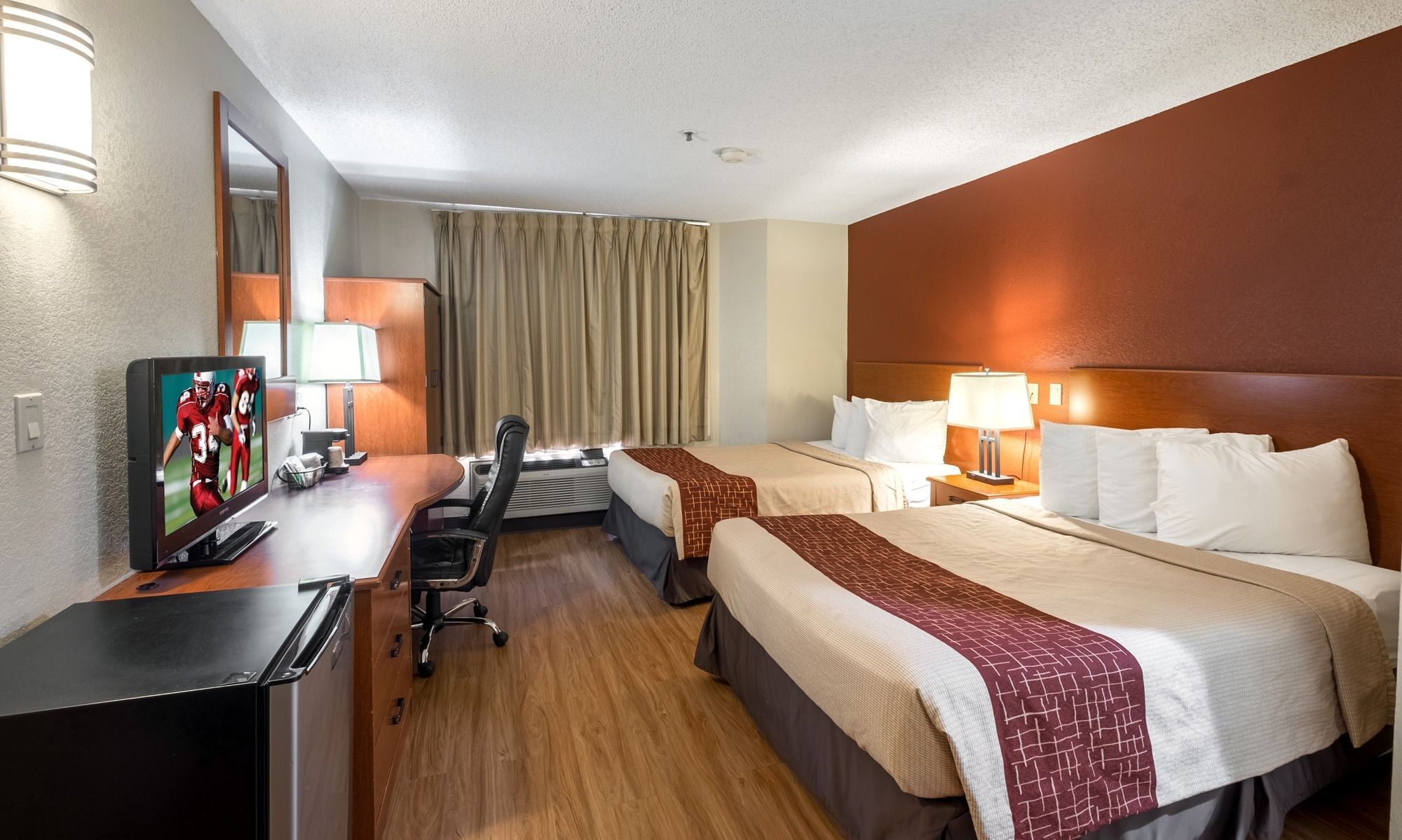 standard double room, 2 double beds | desk, laptop workspace, blackout curtains, iron/ironing board