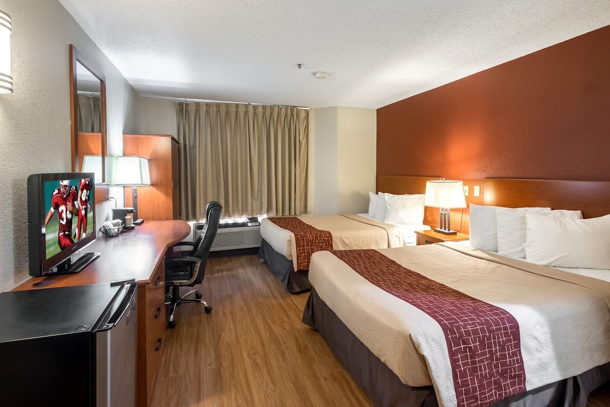 standard double room, 2 double beds | desk, laptop workspace, blackout curtains, iron/ironing board