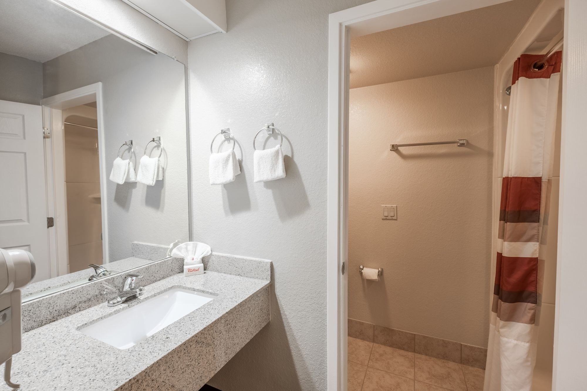 combined shower/bathtub, free toiletries, hair dryer, towels