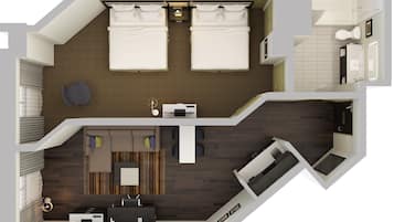 Une chambre d’hôtel moderne dotée d’un grand lit, d’un coin salon avec un canapé et une table basse, d’une salle de bain séparée et d’un petit coin cuisine.