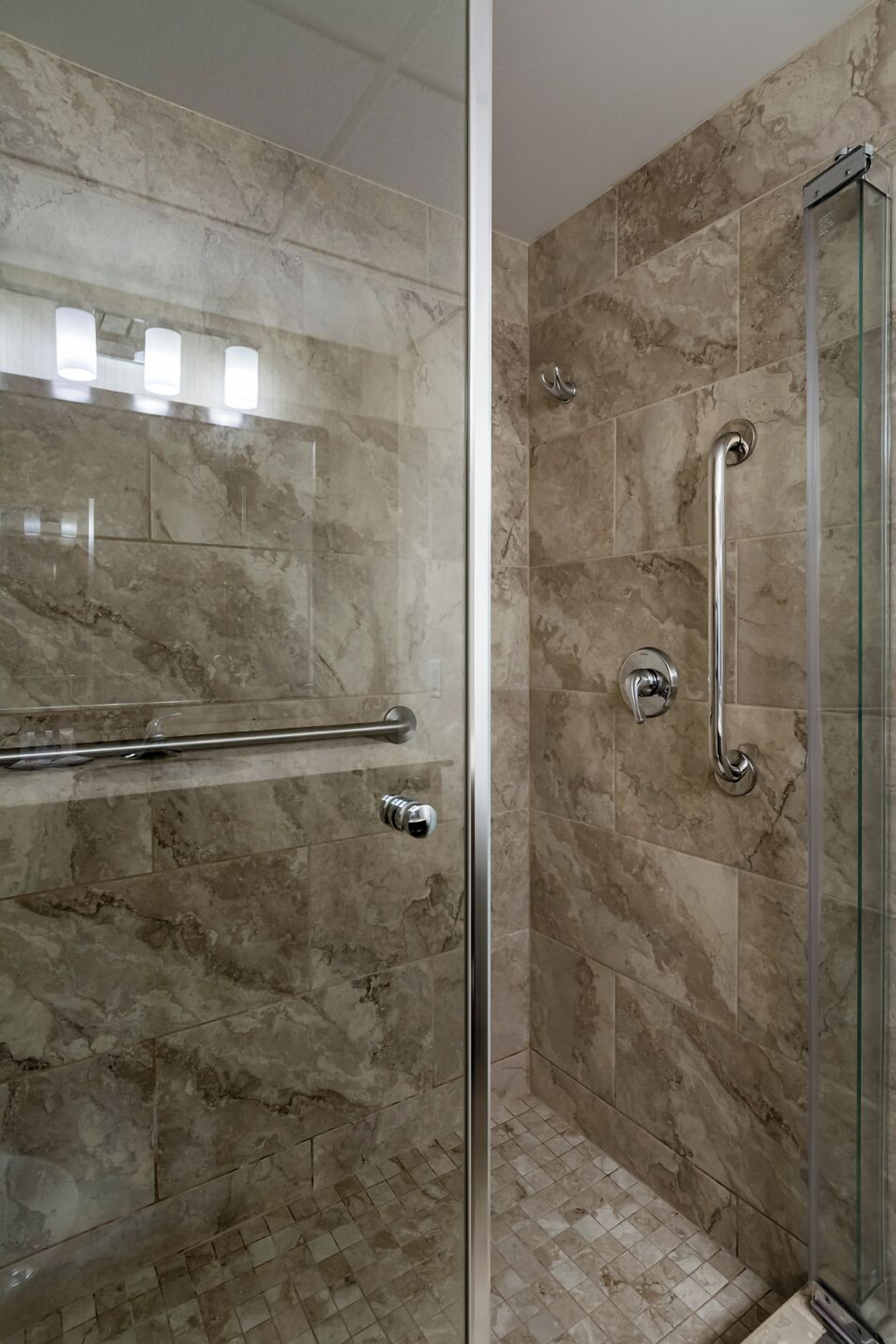 standard king non smoking superior room | bathroom | combined shower/bathtub, rainfall showerhead, free toiletries