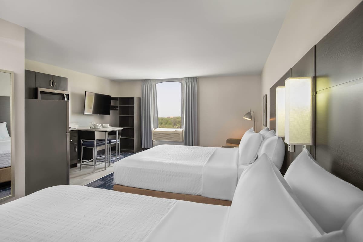 Suite, Multiple Beds, Non Smoking (Efficiency, Upgrade) | Pillowtop beds, desk, laptop workspace, blackout drapes