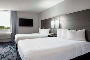 Pillow-top beds, desk, blackout curtains, soundproofing