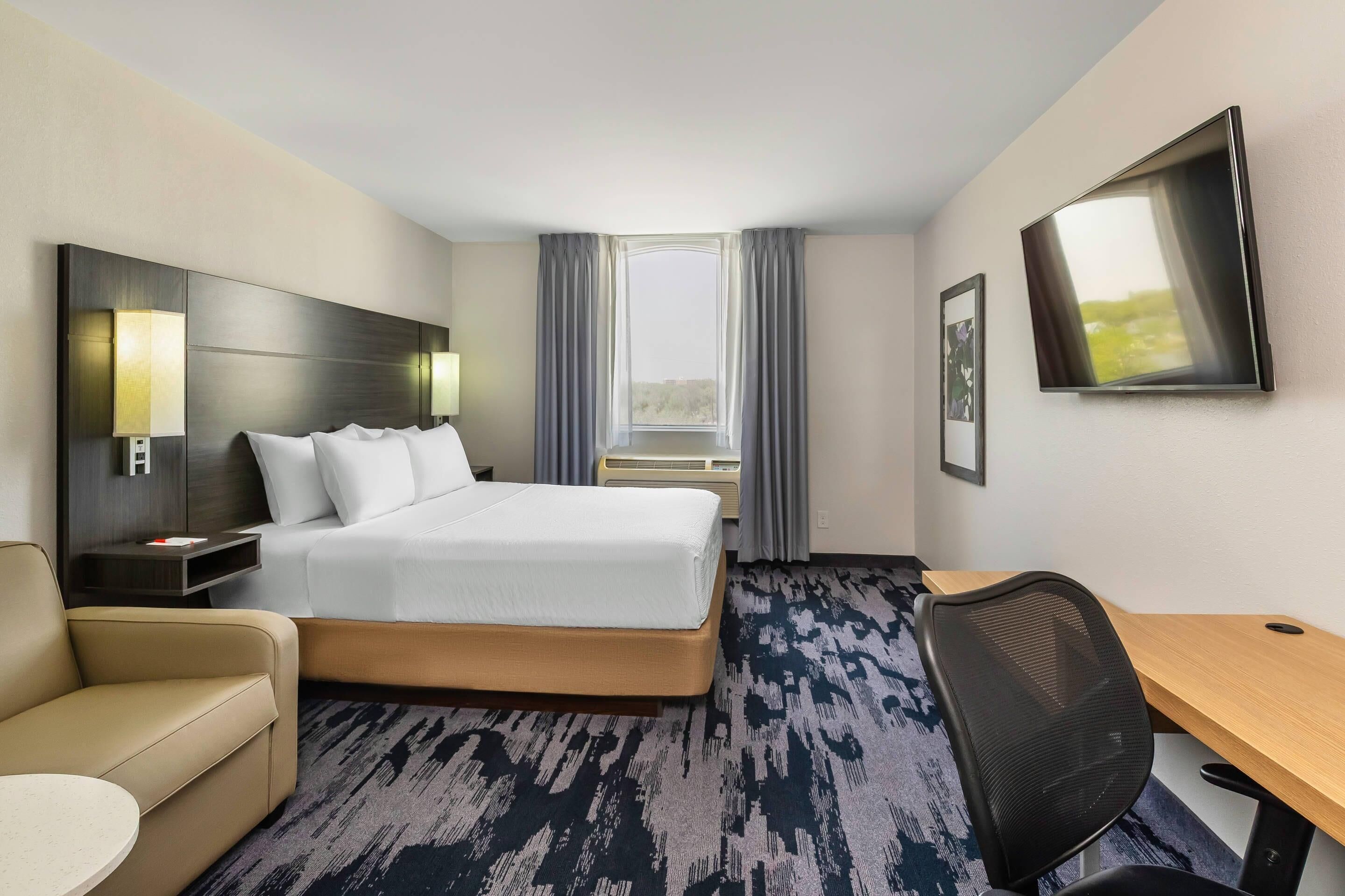 Room, 1 King Bed, Non Smoking | Pillowtop beds, desk, laptop workspace, blackout drapes