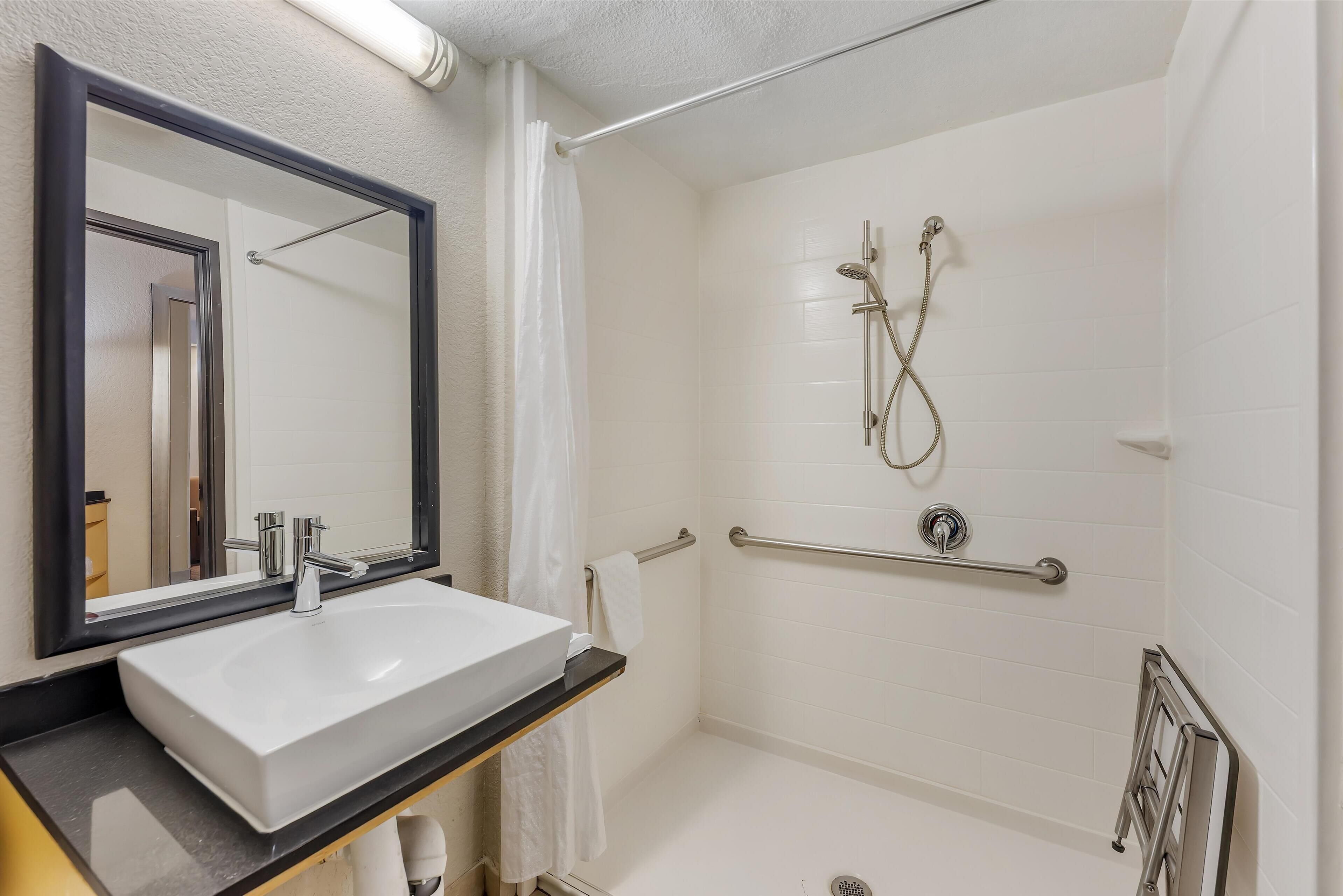 suite, 1 king bed, accessible, non smoking (with sofabed) | bathroom | combined shower/bathtub, free toiletries, hair dryer, towels