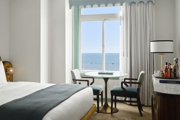 Down comforters, pillowtop beds, minibar, in-room safe