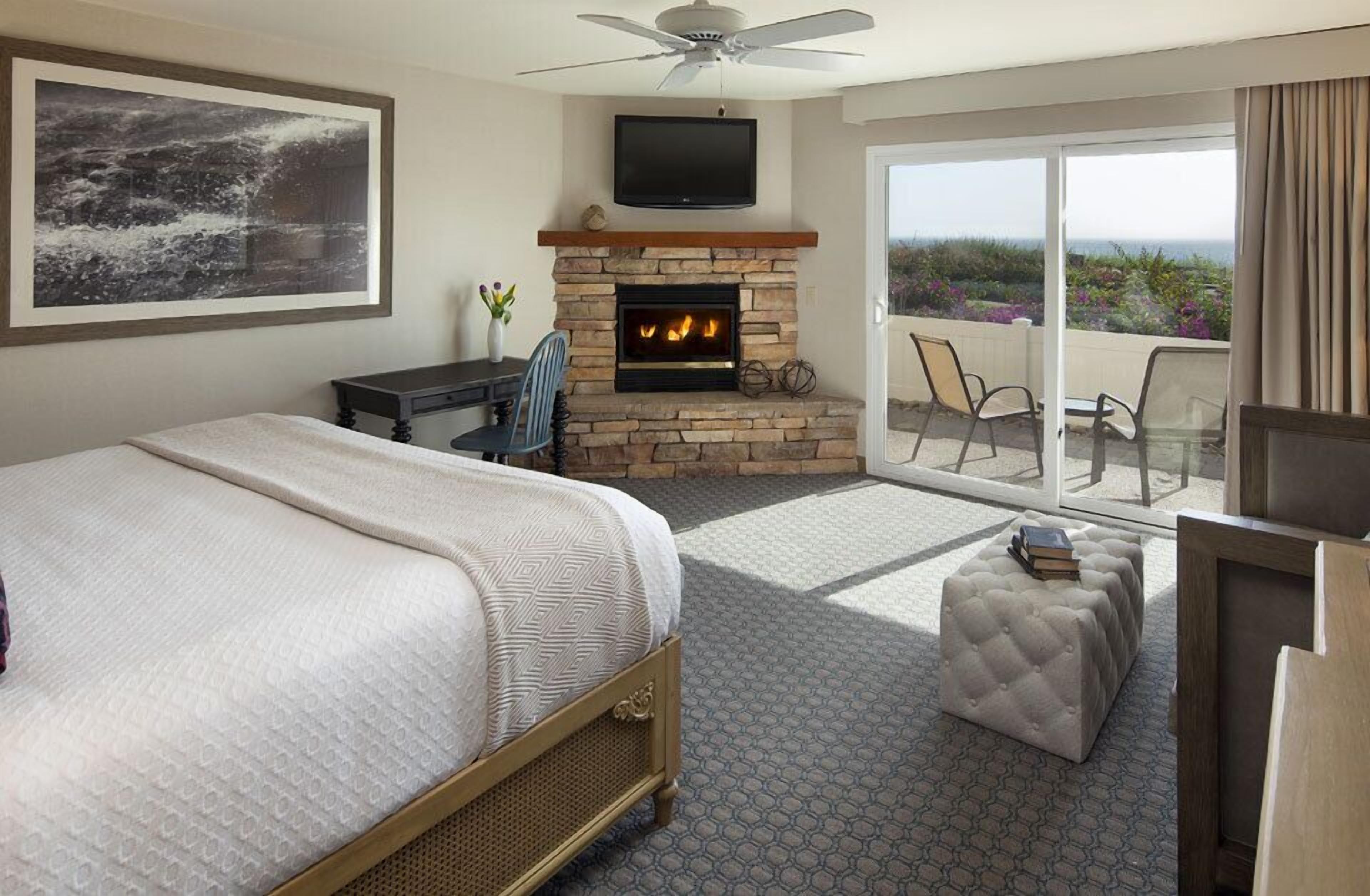 Suite, 1 King Bed with Sofa bed, Fireplace, Ocean View (Patio) | Blackout drapes, iron/ironing board, WiFi (surcharge), bed sheets