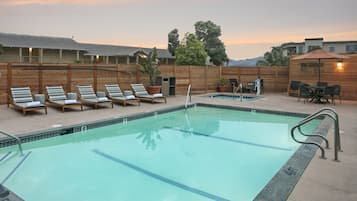 Outdoor pool, open 9 AM to 10:00 PM, pool umbrellas, sun loungers