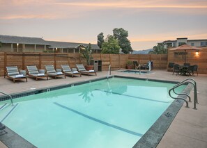 Outdoor pool, open 9 AM to 10:00 PM, pool umbrellas, sun loungers