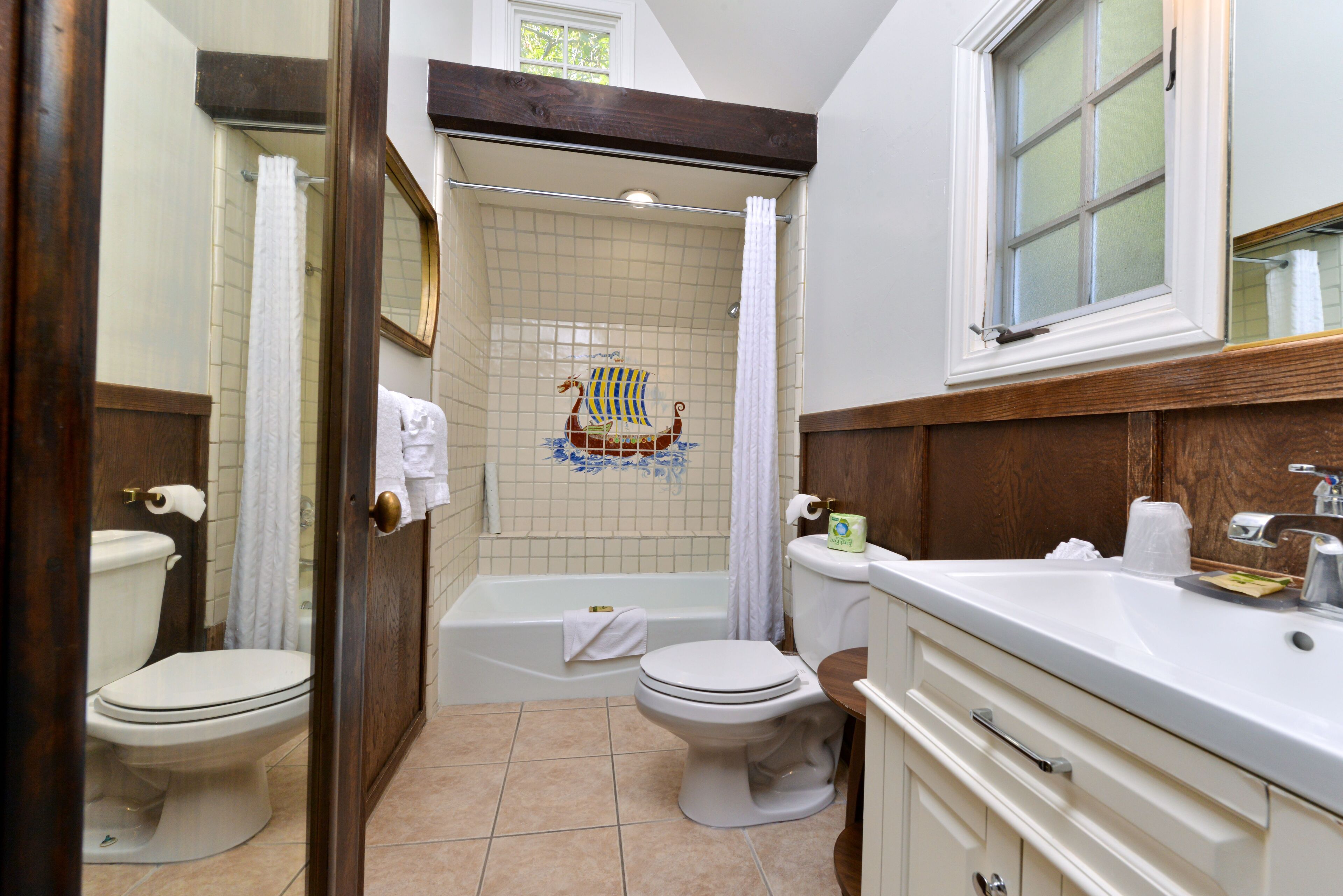 premium cottage | bathroom | hair dryer, towels, soap, shampoo