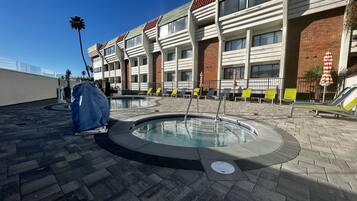 Outdoor pool, open 8:00 AM to 10:00 PM, pool loungers