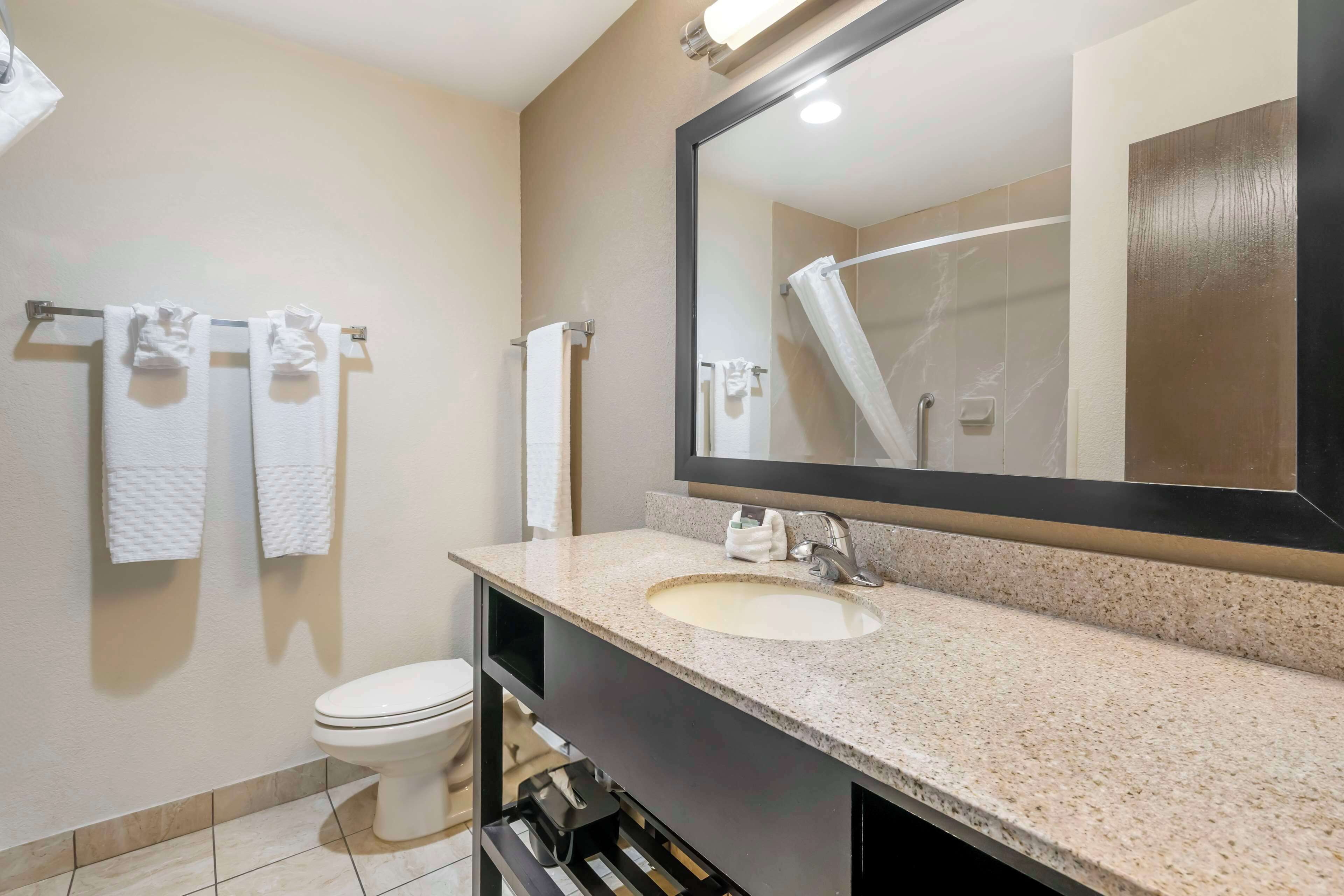 suite, 2 queen beds, non smoking, refrigerator & microwave (with sofabed) | bathroom | combined shower/bathtub, hydromassage showerhead