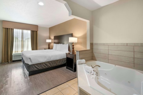 Pillowtop beds, desk, laptop workspace, blackout drapes. Best Western Suites