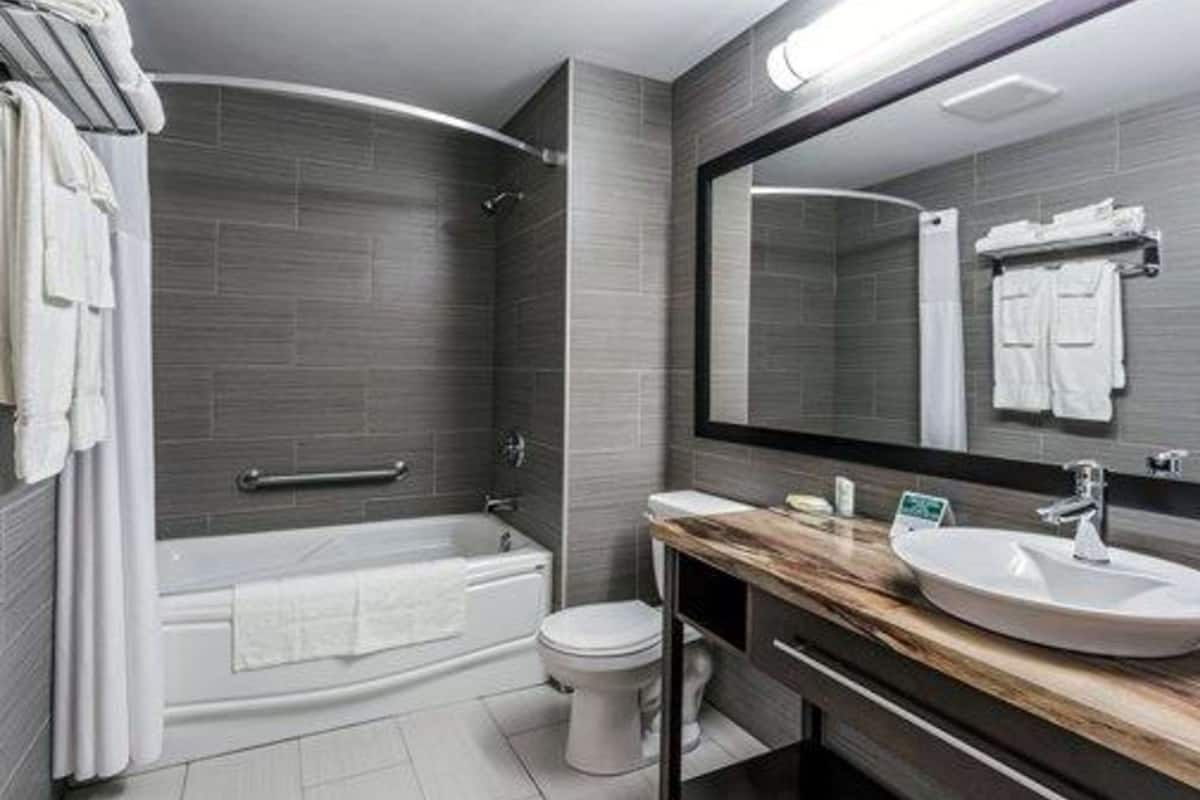 premium bedding, pillow-top beds, desk, blackout curtains