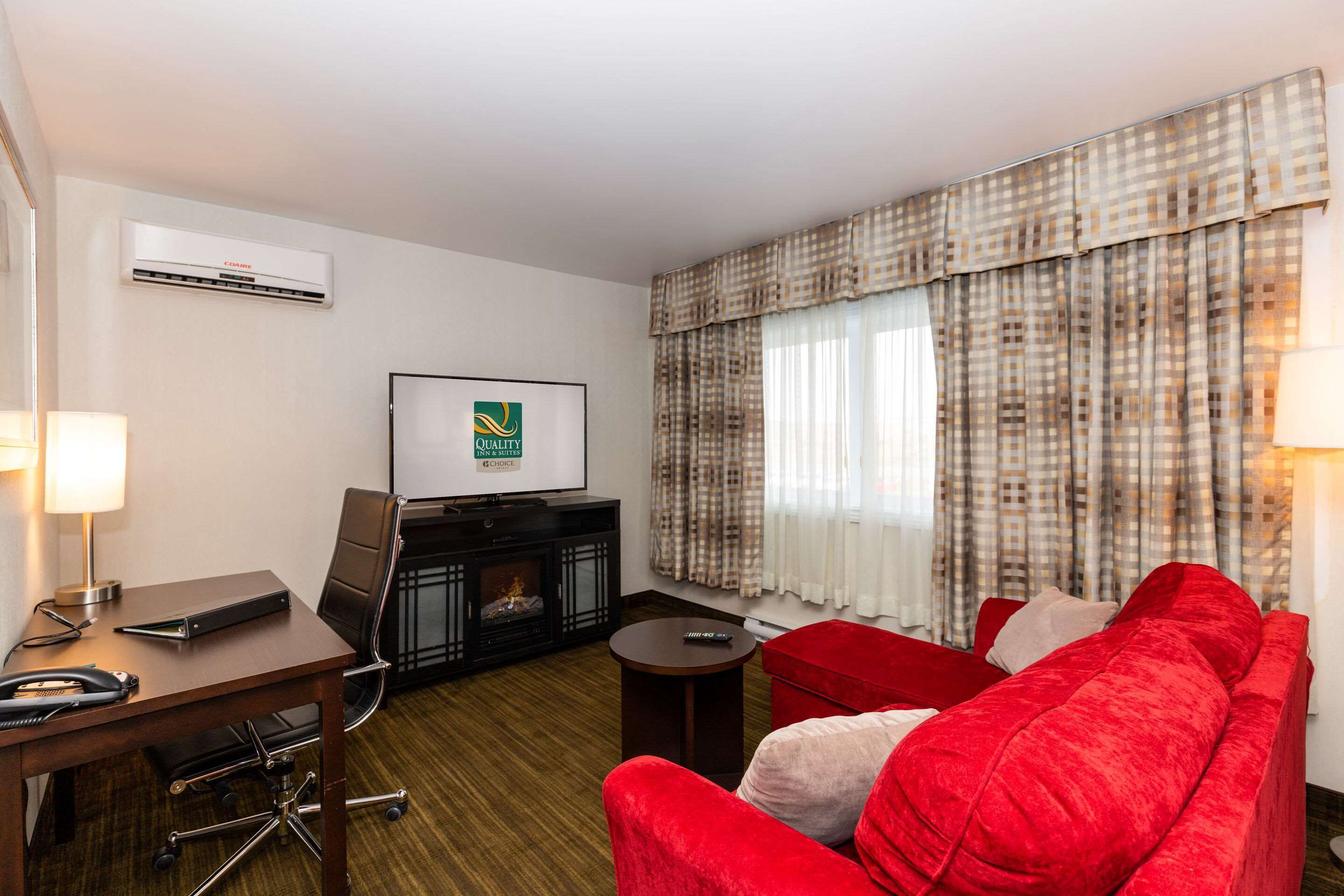 premium bedding, pillow-top beds, desk, blackout curtains