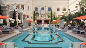 7 outdoor pools, open 9:00 AM to 5:00 PM, cabanas (surcharge)