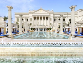 7 outdoor pools, open 9:00 AM to 5:00 PM, cabanas (surcharge) at Caesars Palace
