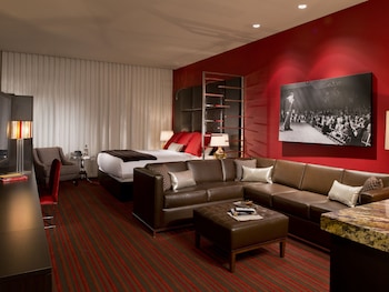 Junior Suite, 1 Bedroom | In-room safe, iron/ironing board, WiFi, bed sheets at Golden Gate Hotel and Casino