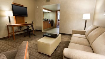 Desk, laptop workspace, blackout drapes, iron/ironing board