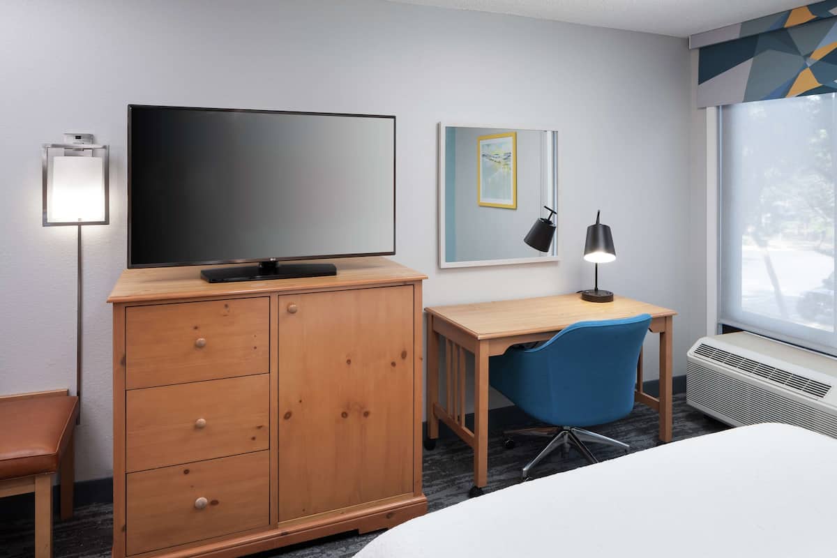 Standard room with two double beds | Premium bedding, desk, laptop workspace, blackout drapes
