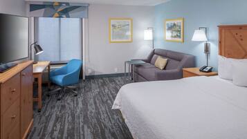 Premium bedding, desk, laptop workspace, blackout curtains