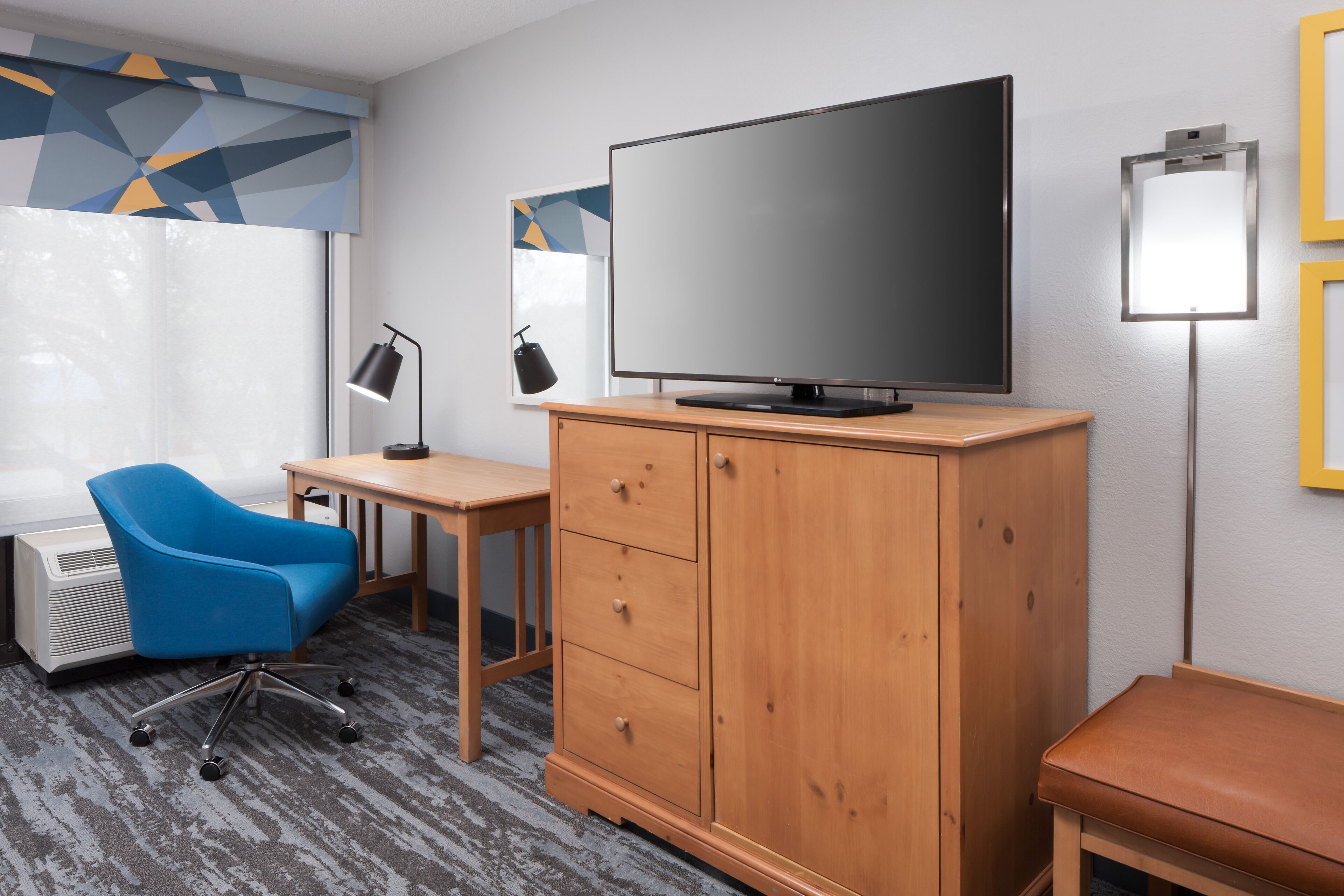 premium bedding, desk, laptop workspace, blackout curtains