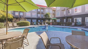 Outdoor pool, pool umbrellas, sun loungers