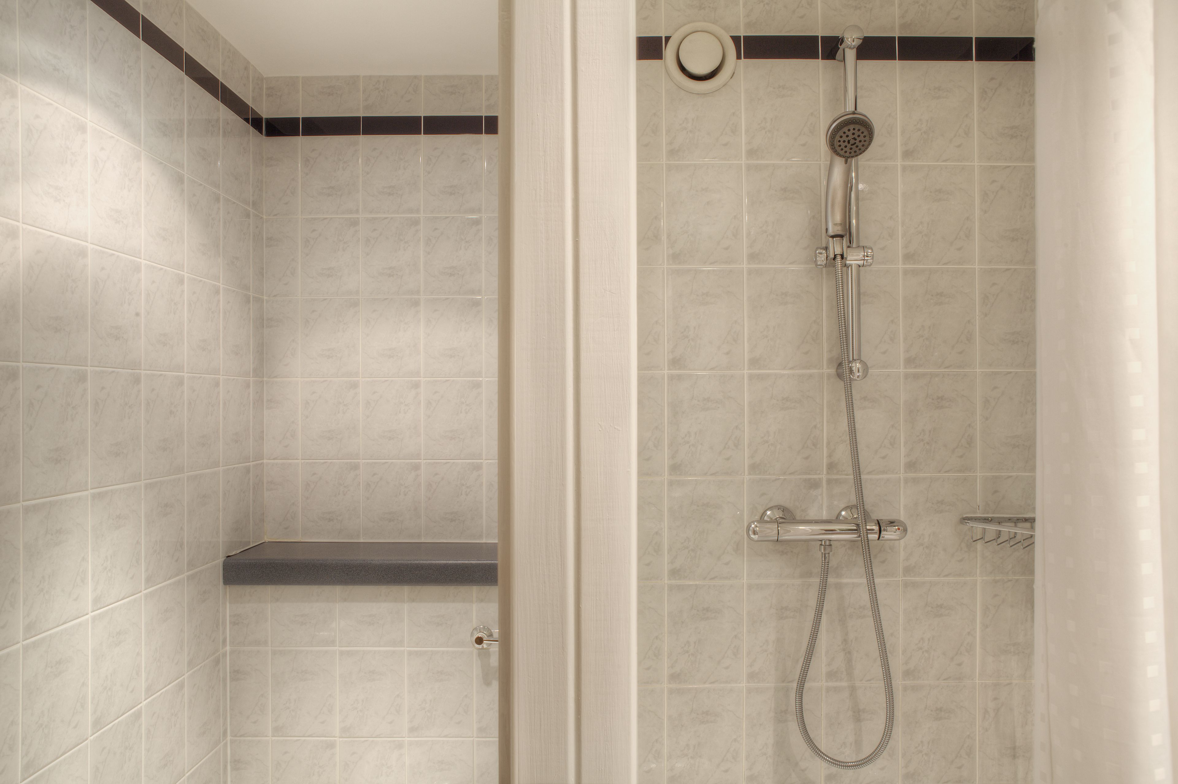 Shower, eco-friendly toiletries, hair dryer, towels