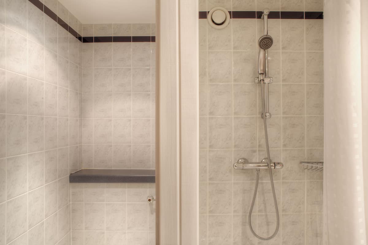 Shower, eco-friendly toiletries, hair dryer, towels