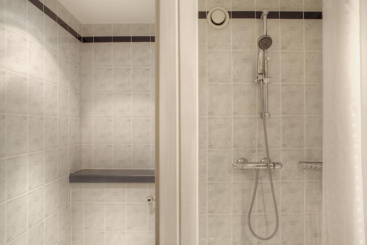 Shower, eco-friendly toiletries, hair dryer, towels