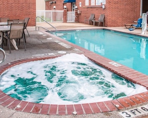 Seasonal outdoor pool, open 10:00 AM to 10:00 PM, pool loungers