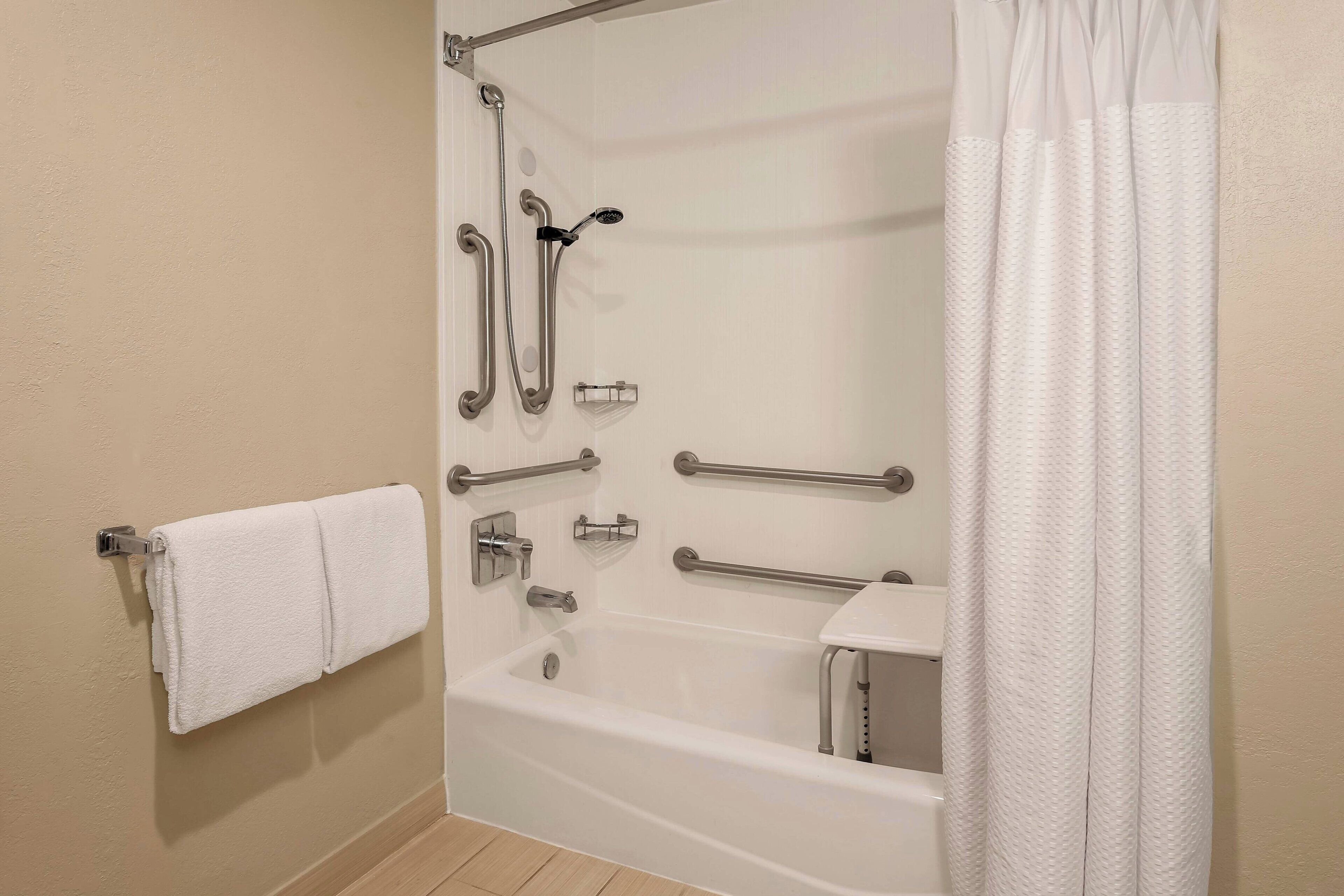 combined shower/bathtub, free toiletries, hair dryer, towels