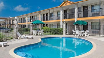 Outdoor pool, open 10:00 AM to 10:00 PM, pool umbrellas, sun loungers