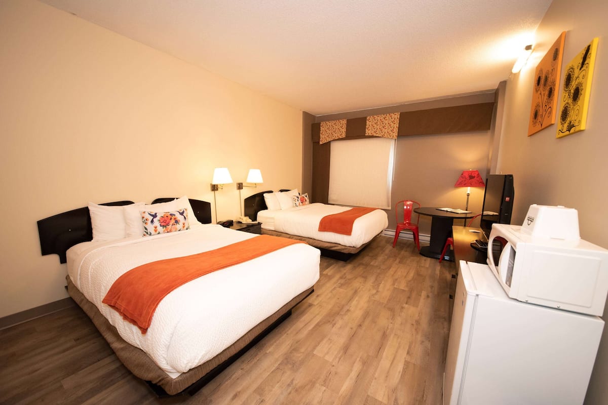 Room, 2 Double Beds, Non Smoking | Premium bedding, down comforters, pillowtop beds, individually decorated
