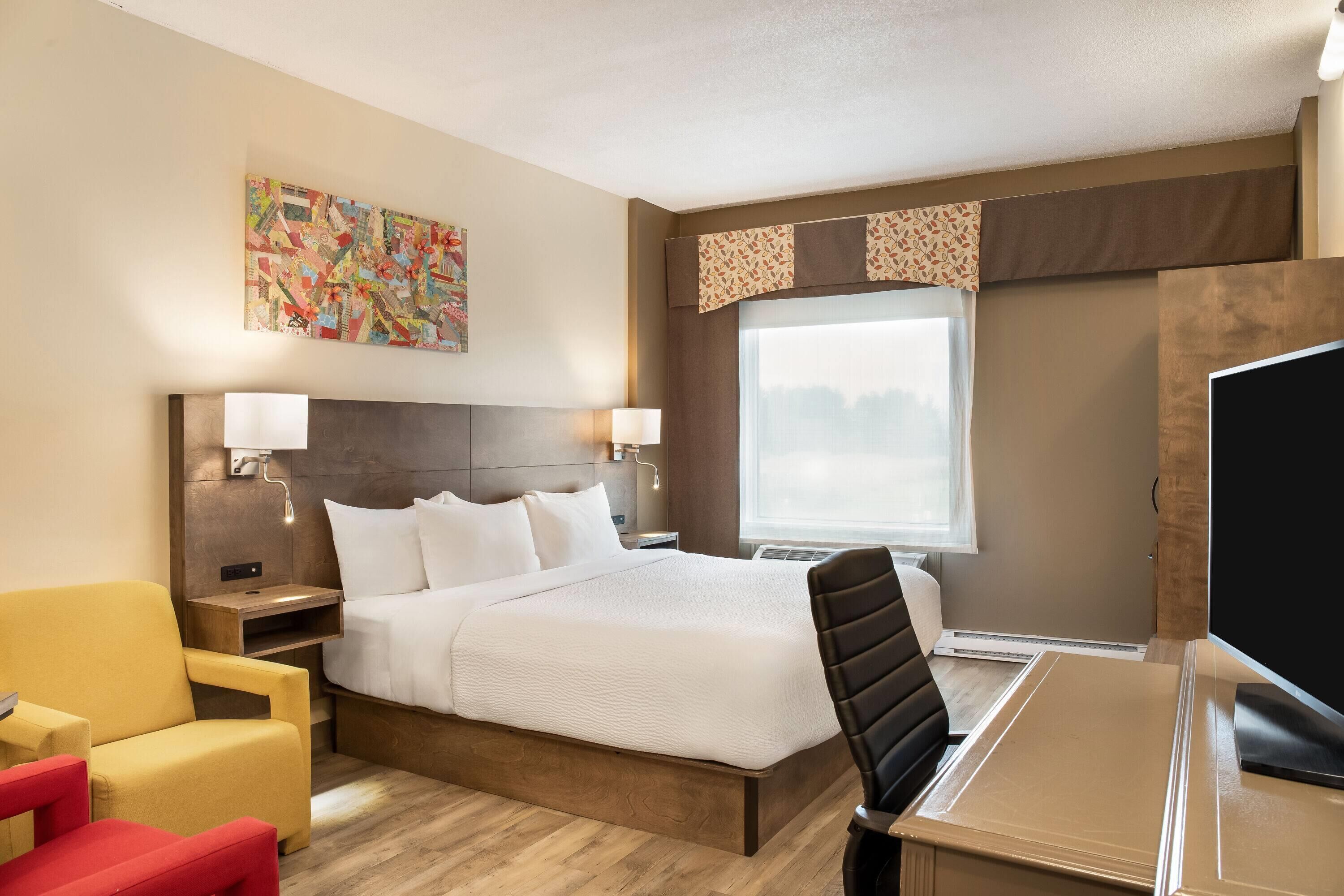 Room, 1 King Bed, Non Smoking | Premium bedding, down comforters, pillowtop beds, individually decorated