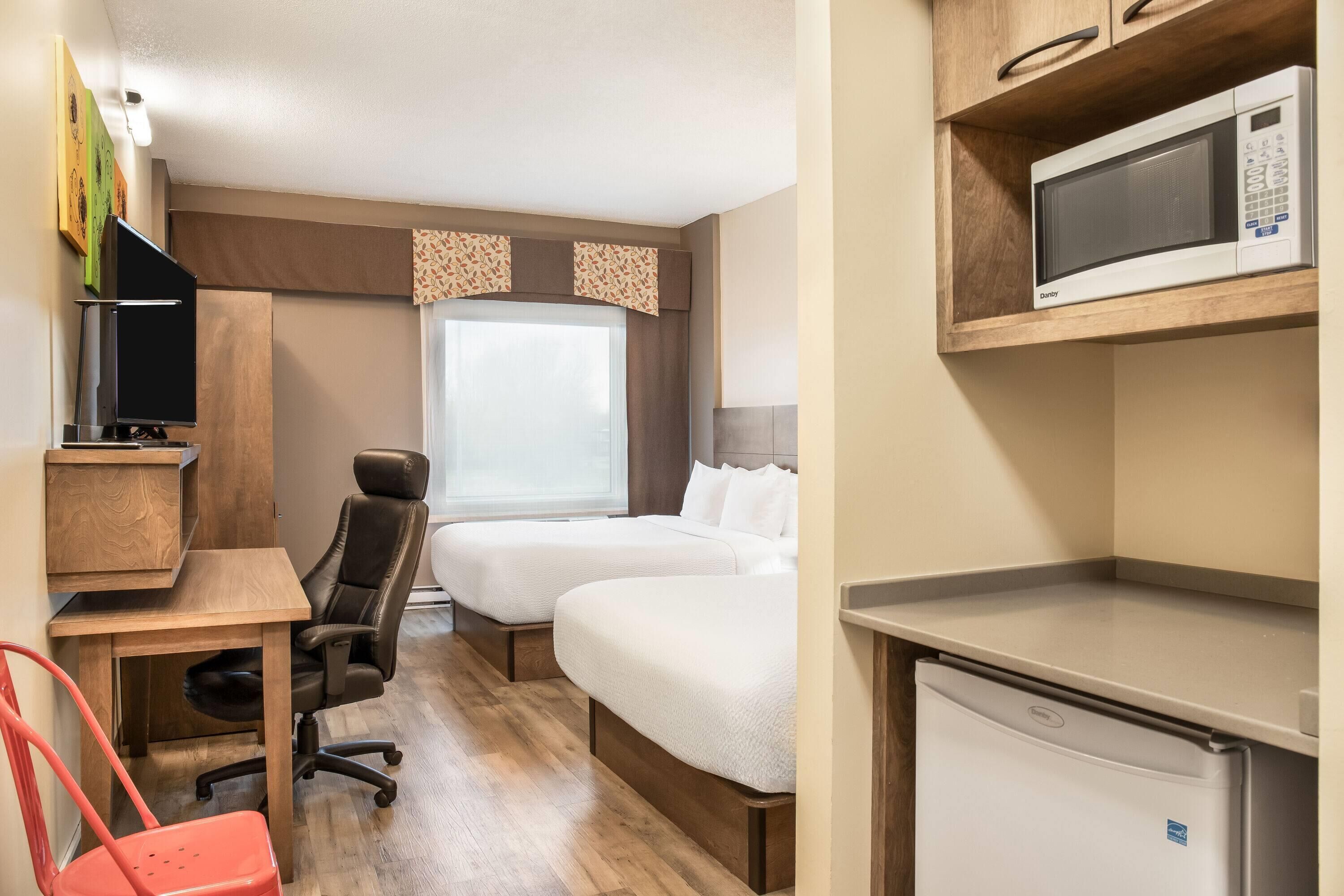 Room, 2 Queen Beds, Non Smoking | Premium bedding, down comforters, pillowtop beds, individually decorated