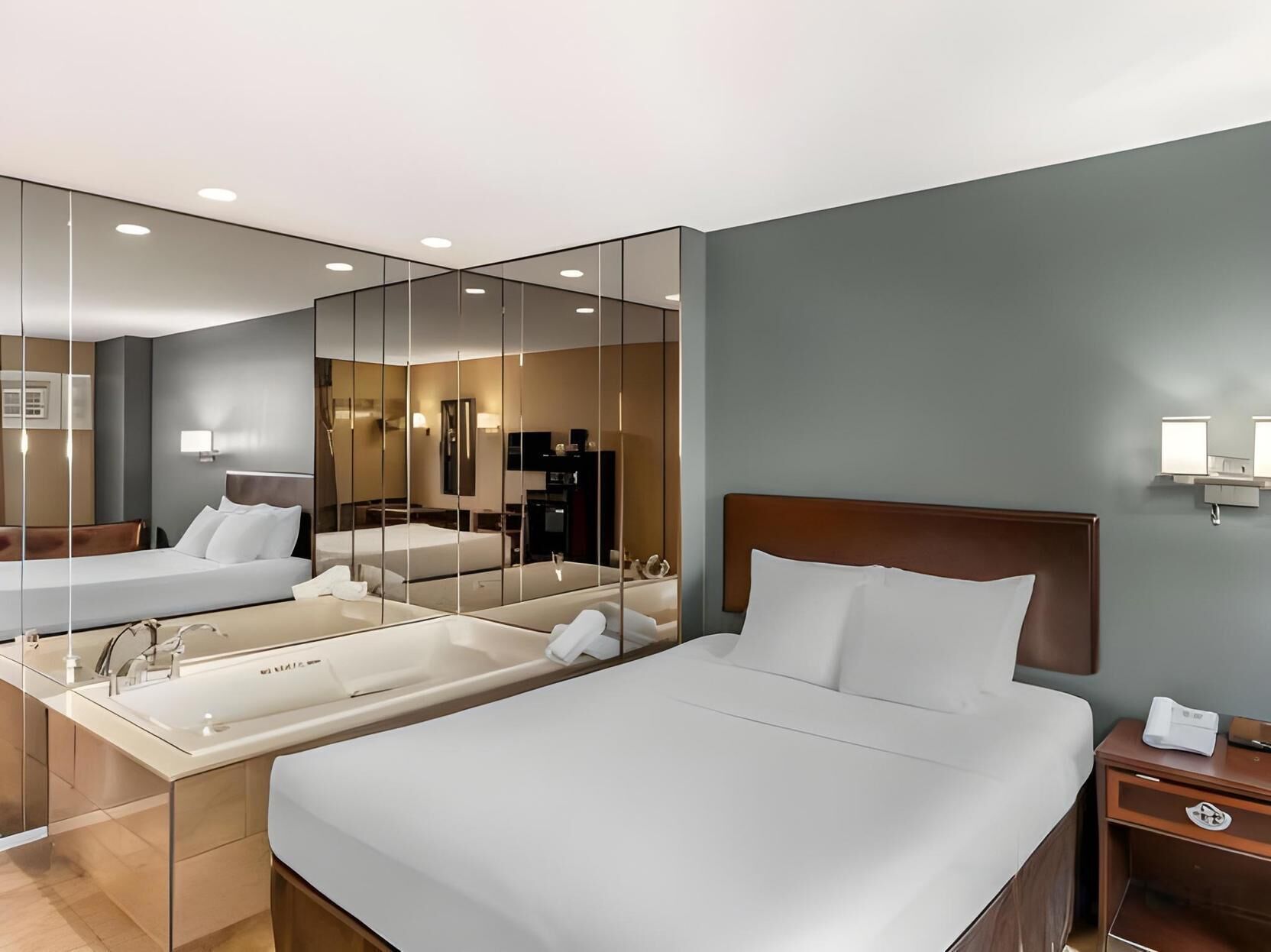 Premium bedding, Tempur-Pedic beds, desk, blackout curtains