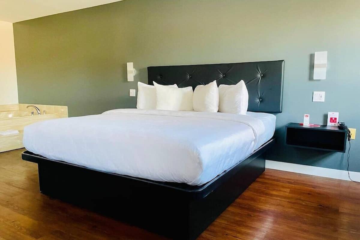 Premium bedding, Tempur-Pedic beds, desk, blackout drapes