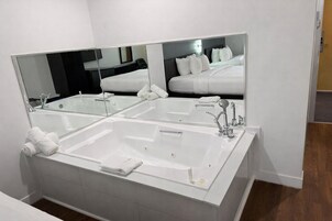 Combined shower/tub, hair dryer, towels, soap