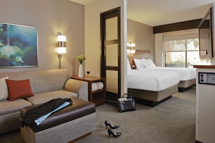 Premium bedding, pillowtop beds, desk, laptop workspace