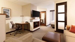 Premium bedding, pillow-top beds, desk, laptop workspace
