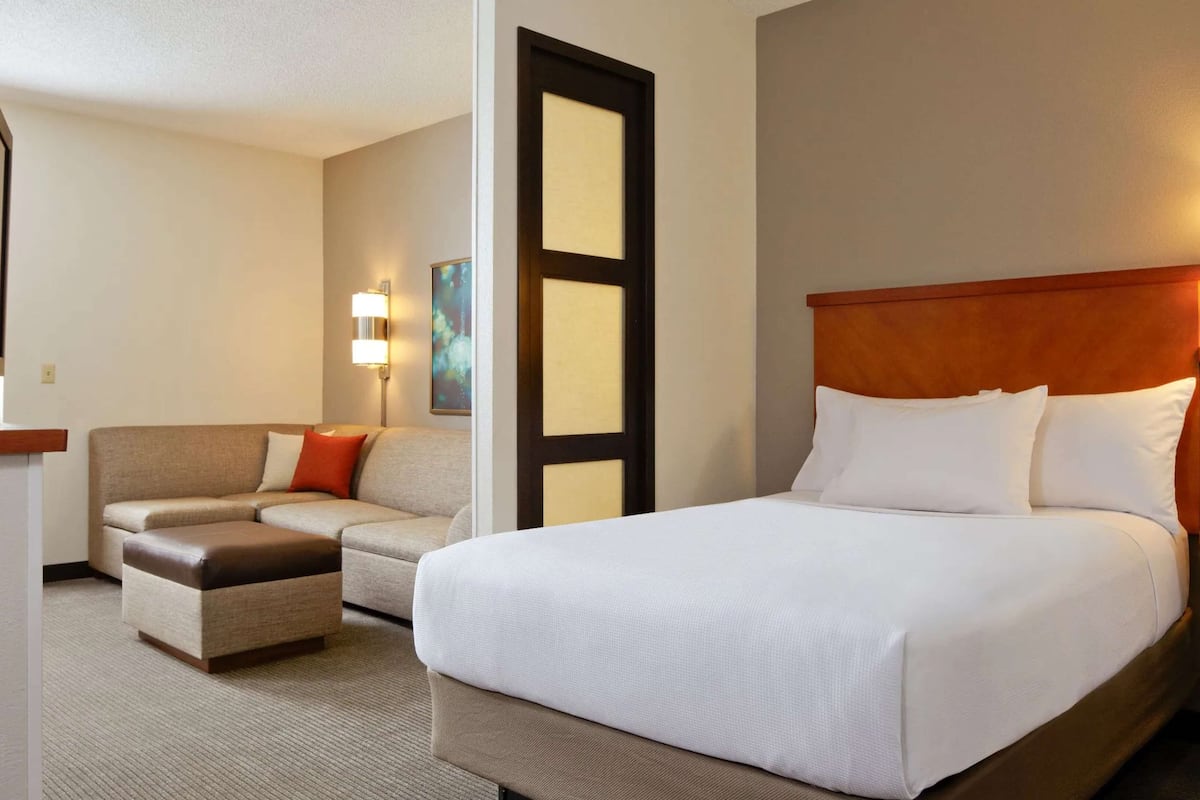 Premium bedding, pillow-top beds, desk, laptop workspace
