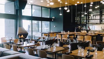 Breakfast, dinner served; local cuisine, garden views