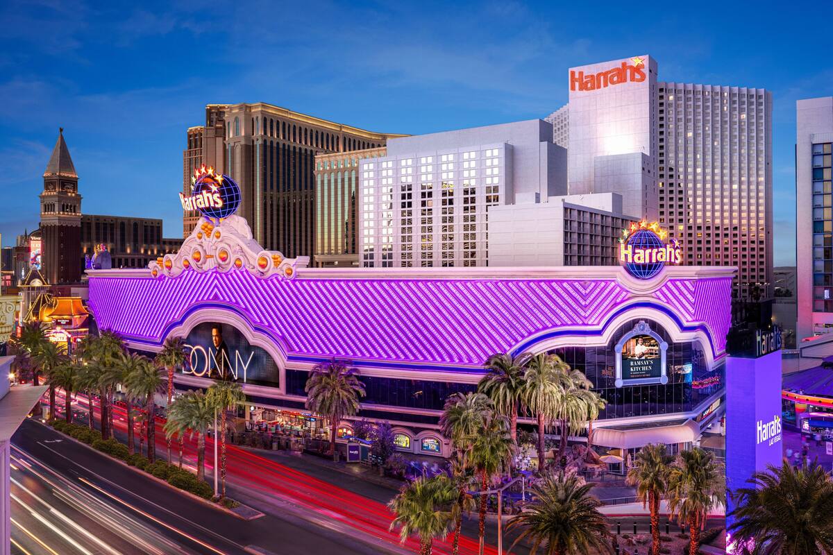A hotel with a prominent 'Harrath's' sign, a large marquee, and a 'Harrath's' restaurant.