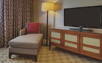 Royal Luxury Suite | Premium bedding, in-room safe, desk, iron/ironing board at Excalibur Hotel & Casino