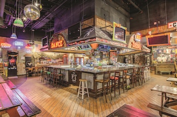 8 bars/lounges, poolside bar at Excalibur Hotel & Casino