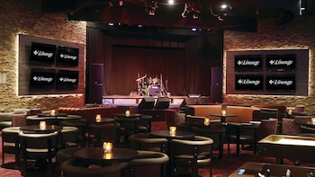 7 bars/lounges, poolside bar at Excalibur Hotel & Casino