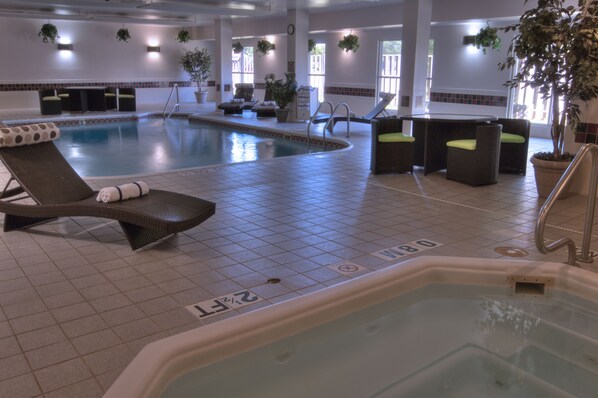 Indoor pool, open 10:00 AM to 11 PM, pool loungers