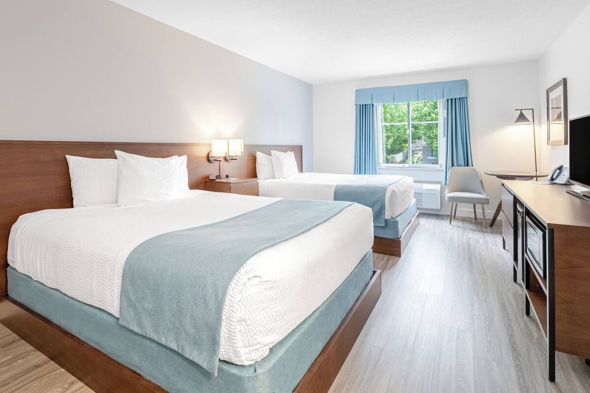 Business Room, 2 Queen Beds | Premium bedding, in-room safe, desk, blackout drapes